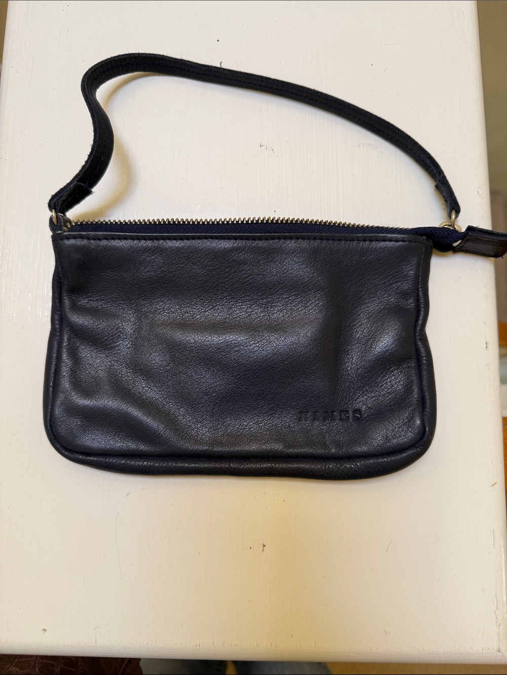 Women’s 100% Navy Leather Wristlet - striped interior